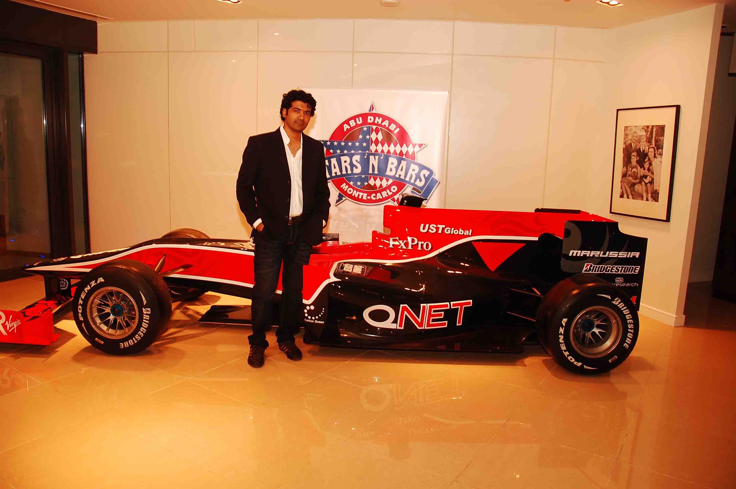 With the QNet Virgin Racing F1